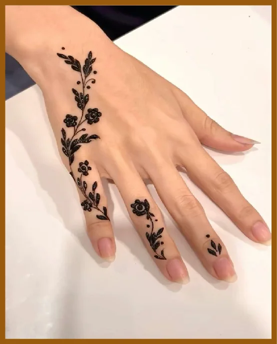 Stylish Khafif Back Hand Design Featuring Leaf Trails Khafif (Minimal) Back Hand Mehndi Design